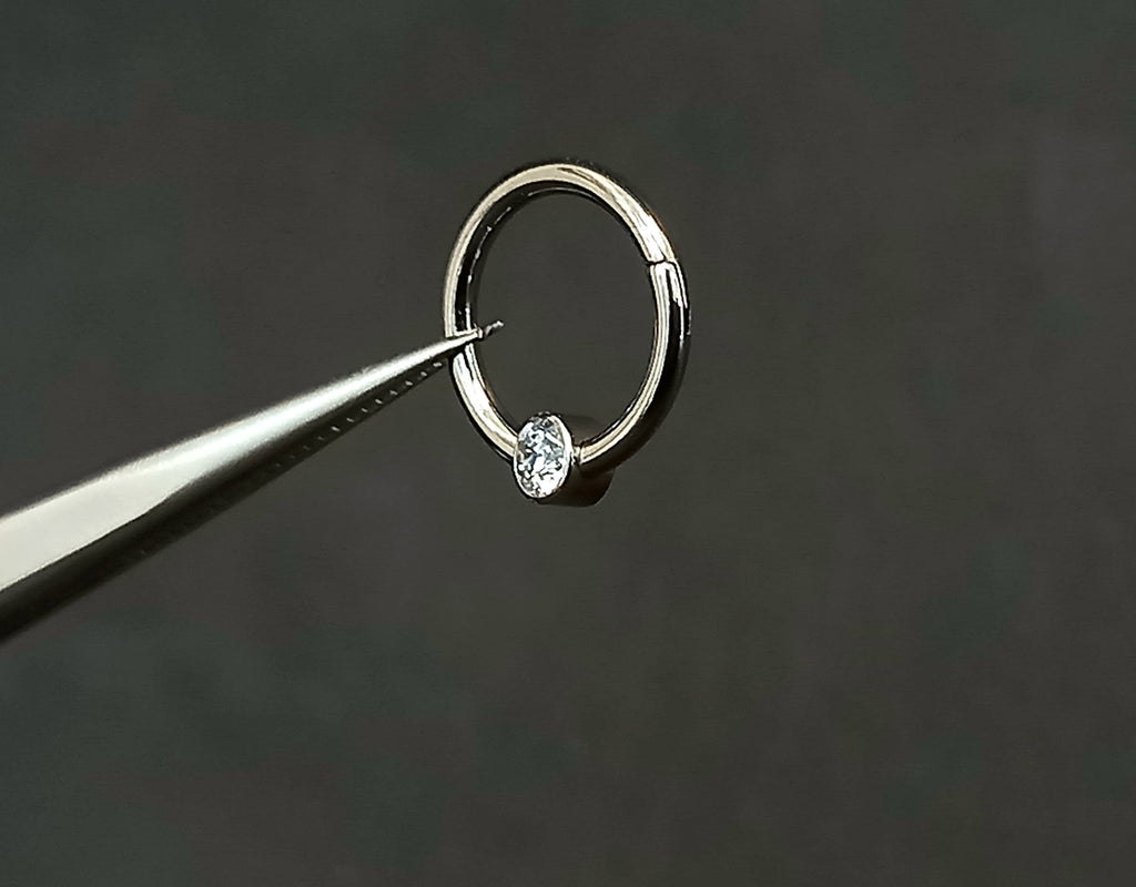 Argolla clicker brillo central clear