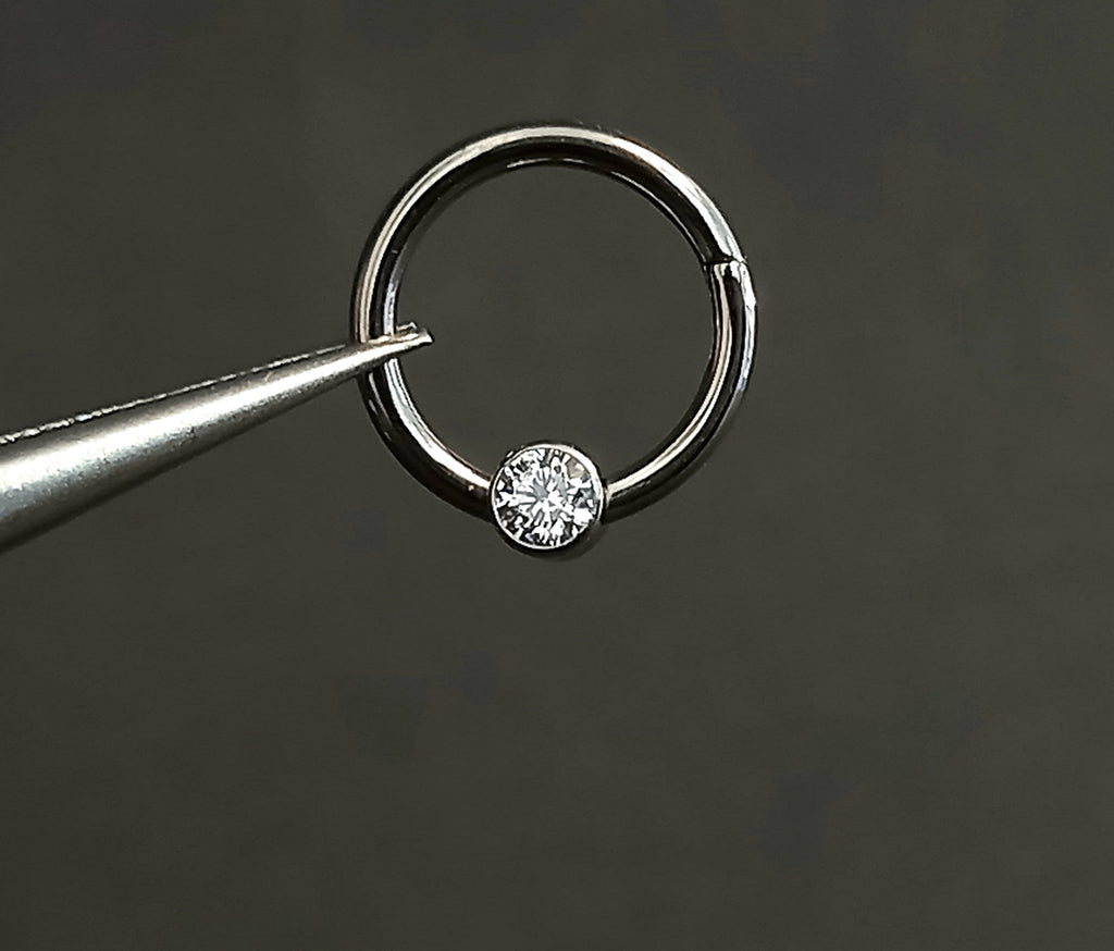 Argolla clicker brillo central clear