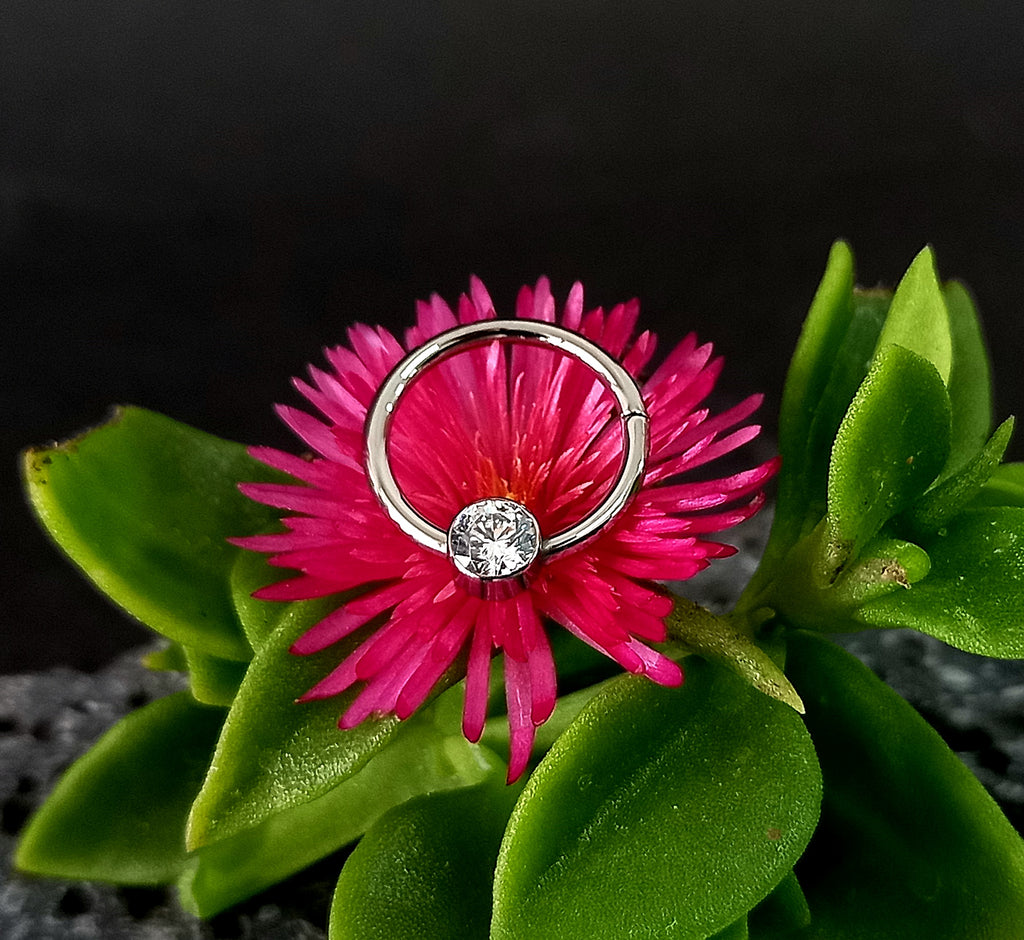 Argolla clicker brillo central clear