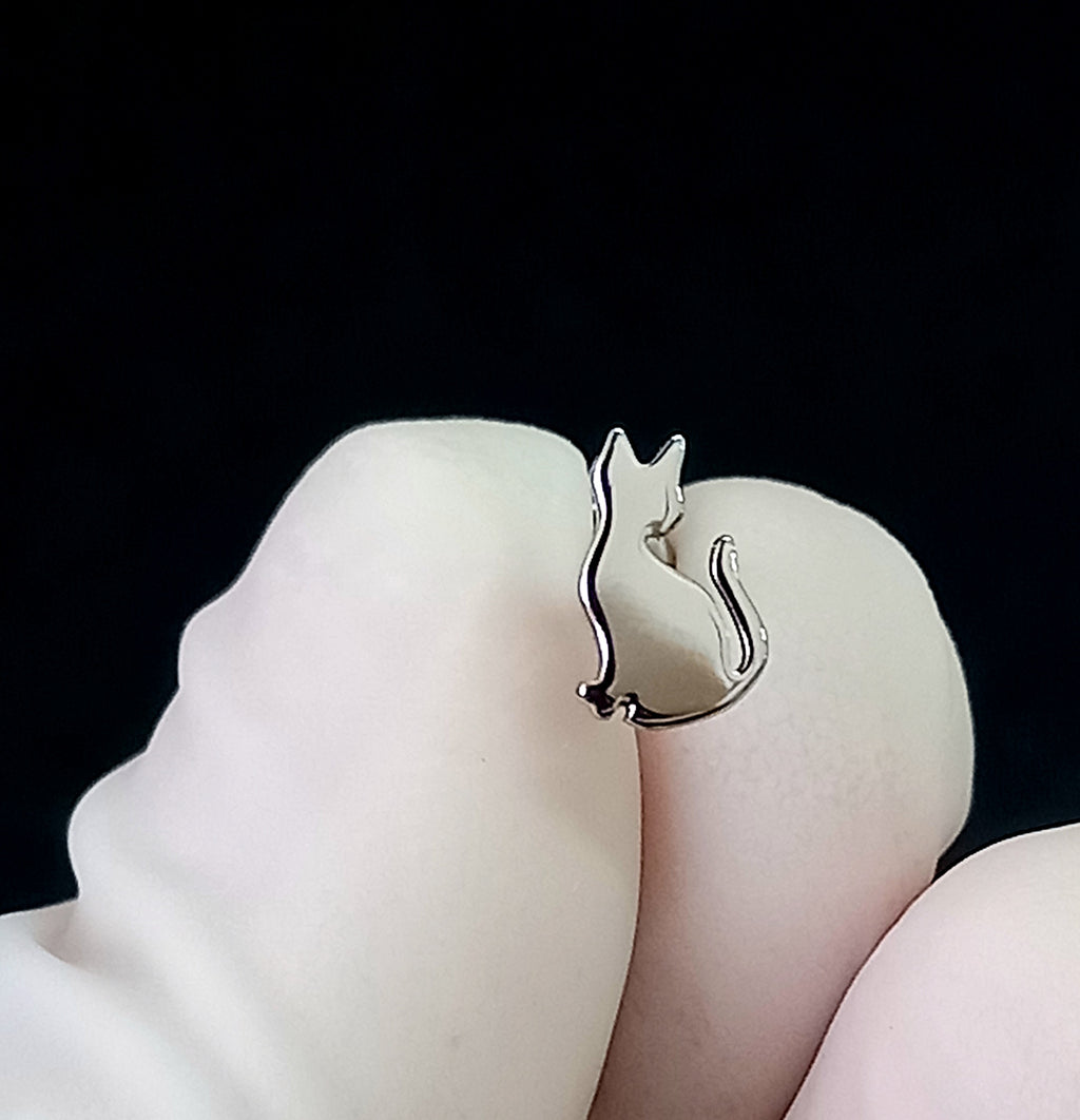 Gato sentado - titanio grado implante ASTM F-136