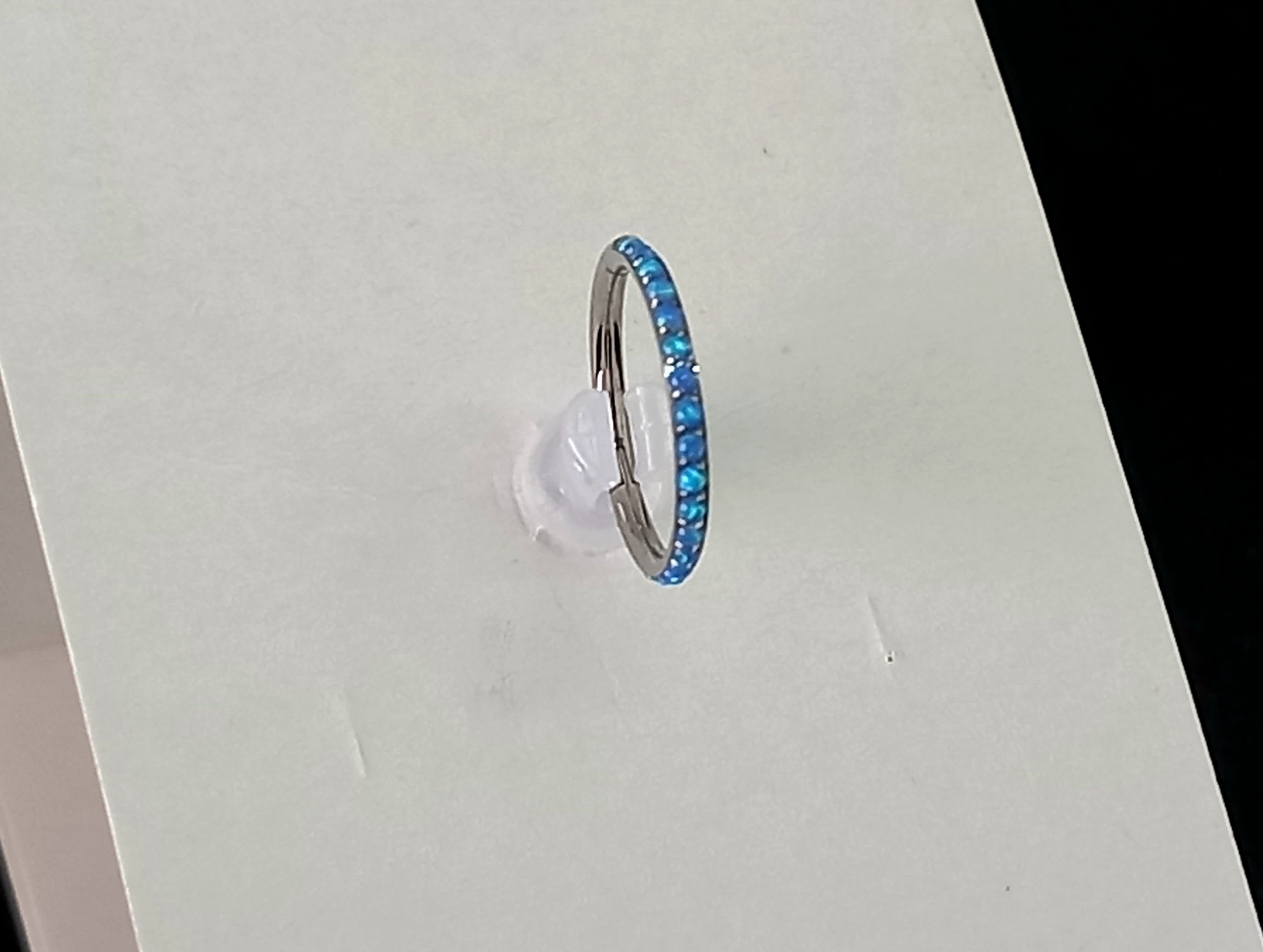 Argolla clicker ópalo lateral azul