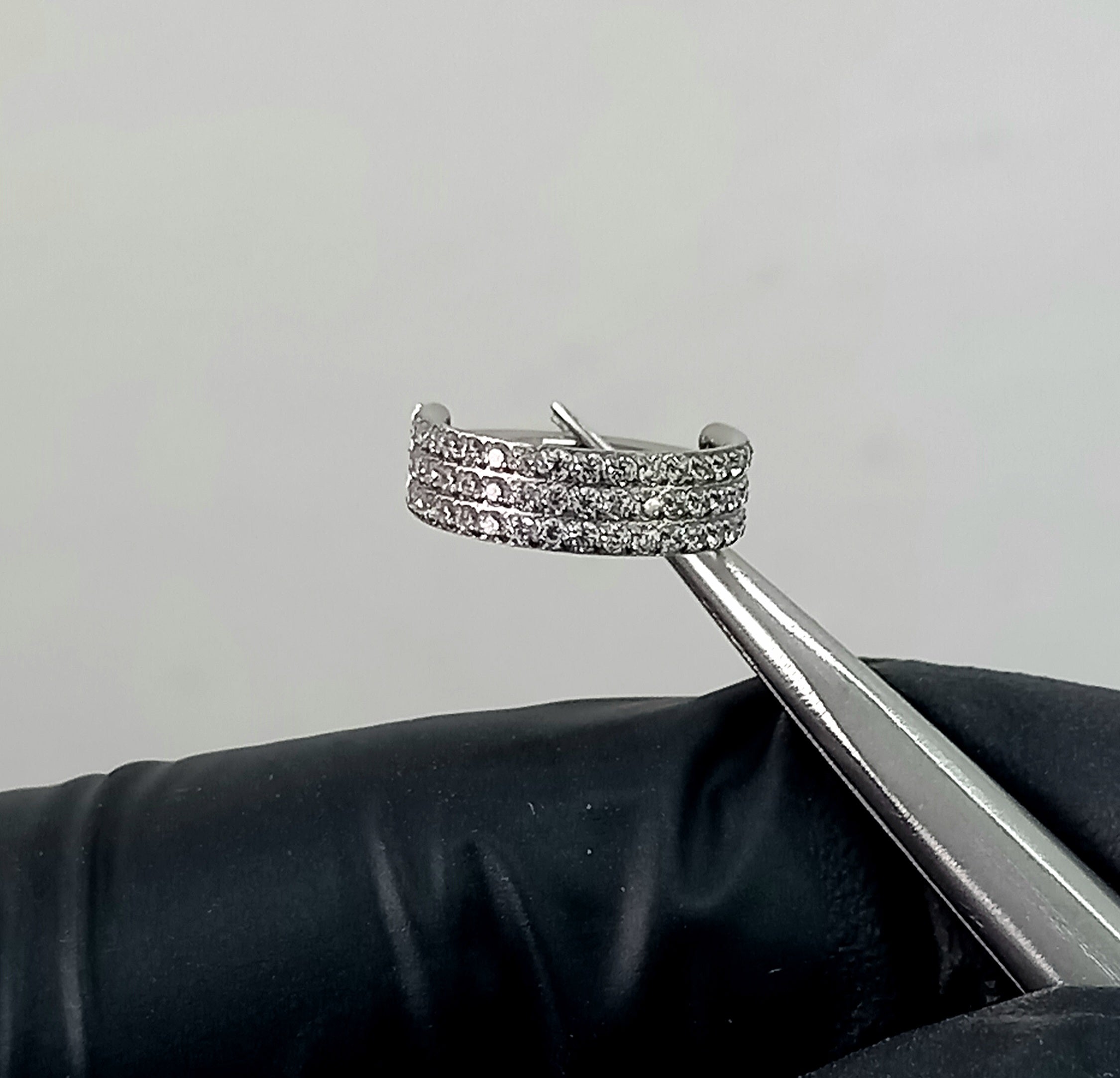 Argolla clicker triple brillo lateral