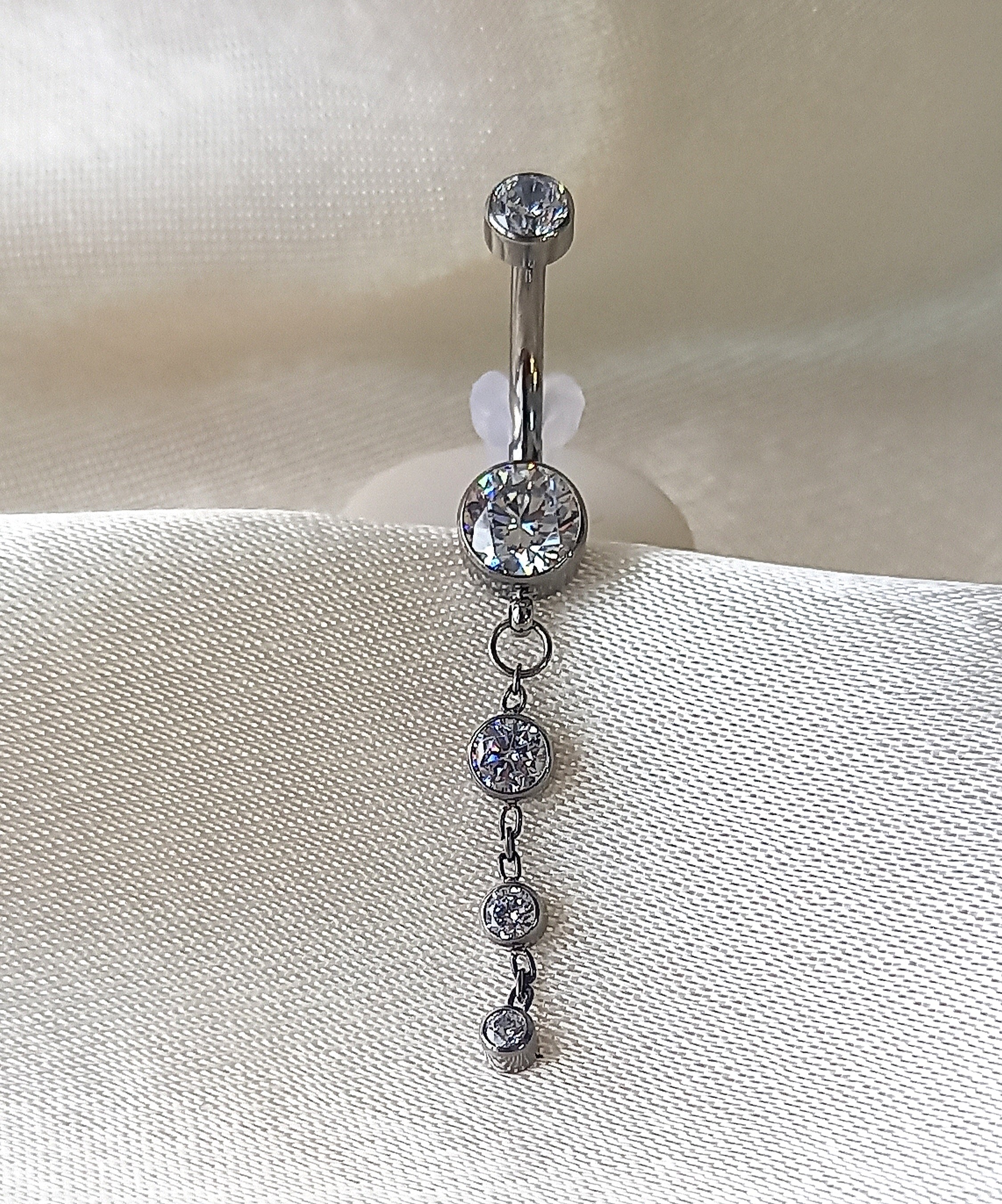 Navel tres brillos colgante