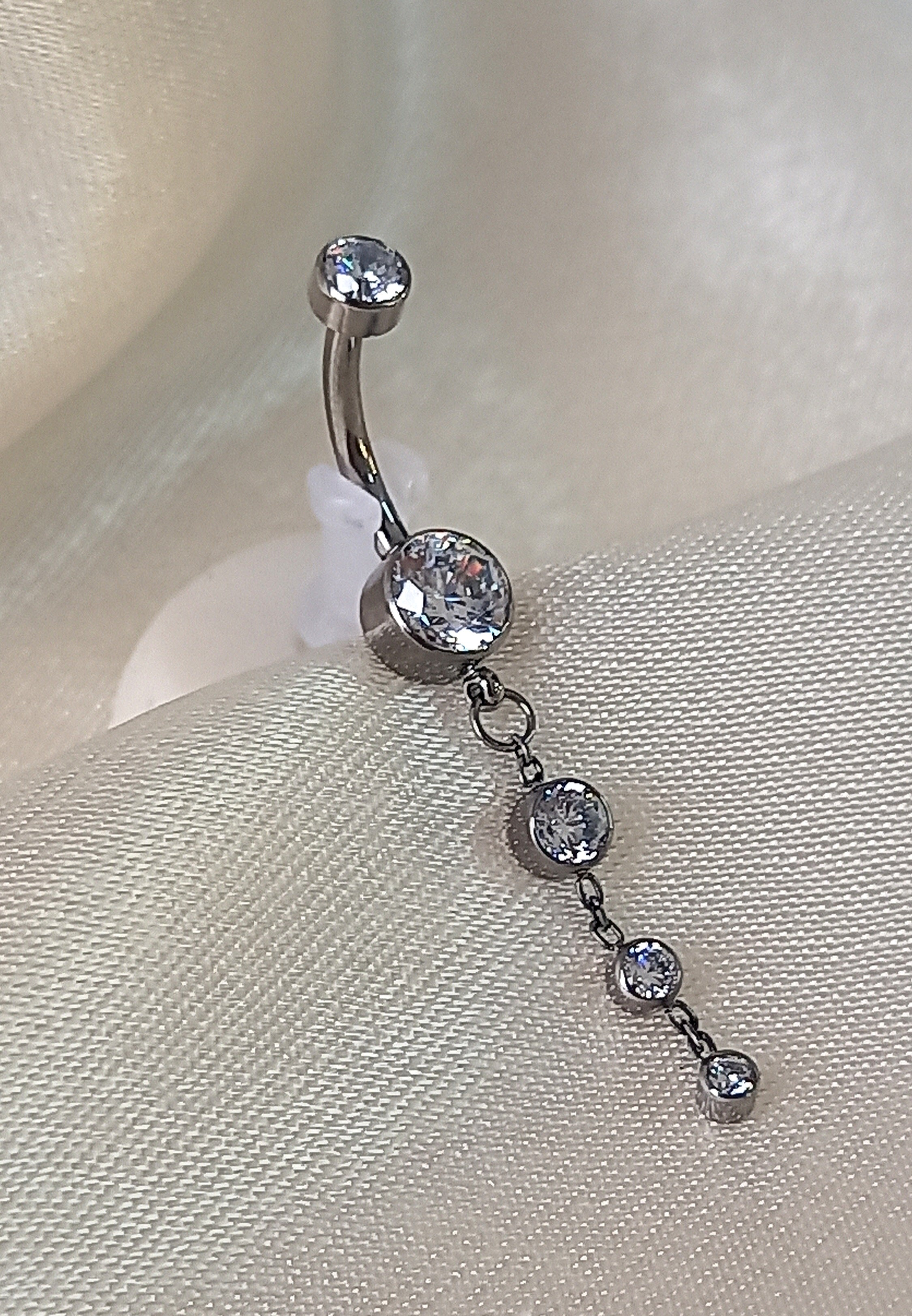 Navel tres brillos colgante