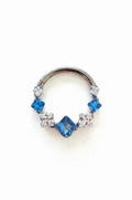 Argolla clicker zircón con rombos azul y clear