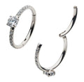 Argolla clicker con brillo prong set central y laterales clear